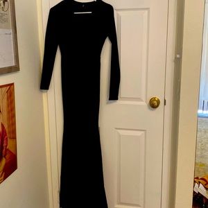 Black floor length fitted mermaid evening dress with low neck